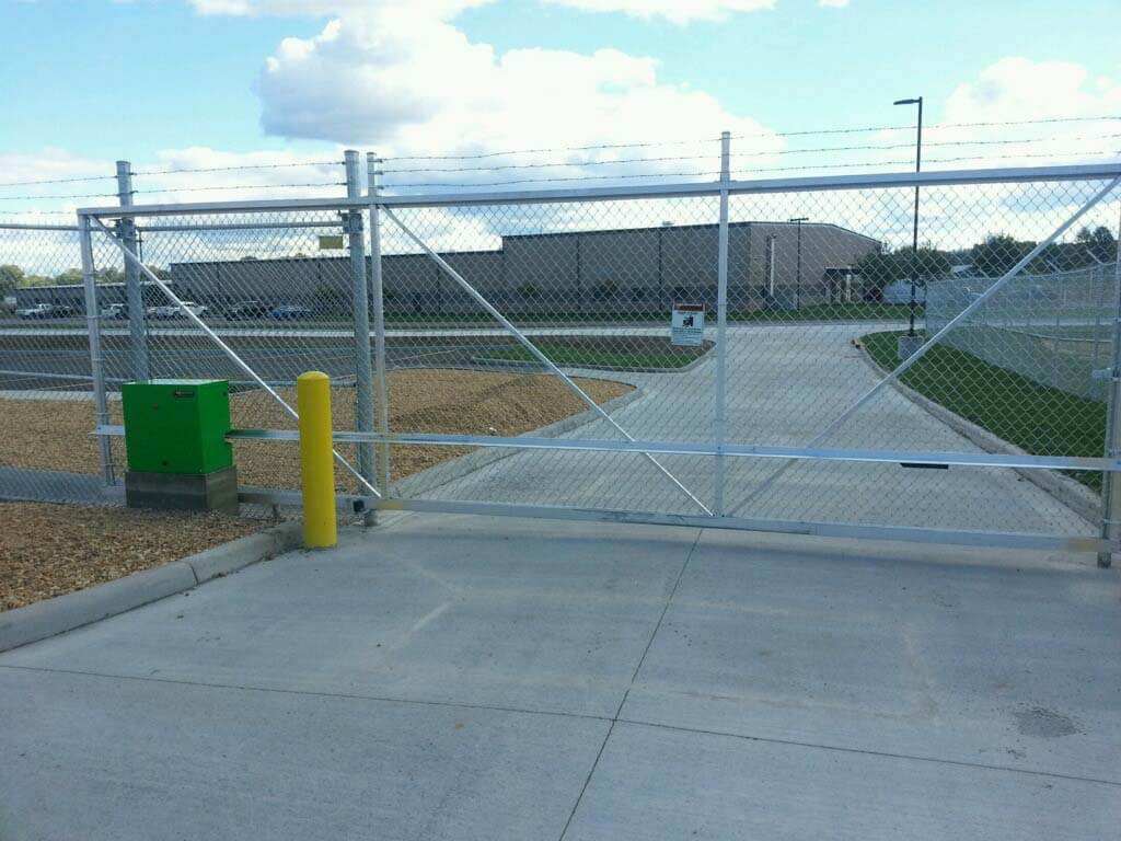 Fence with Sliding commercial chain link gate with gate operator installed in West Virginia in West Virginia